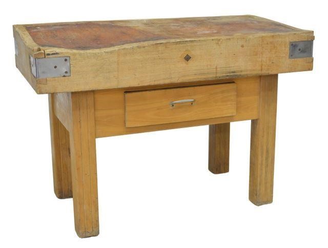 Appraisal: French mixed wood butcher block table well worn end-grain top