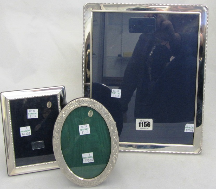 Appraisal: A silver mounted rectangular photograph frame decorated with an outer