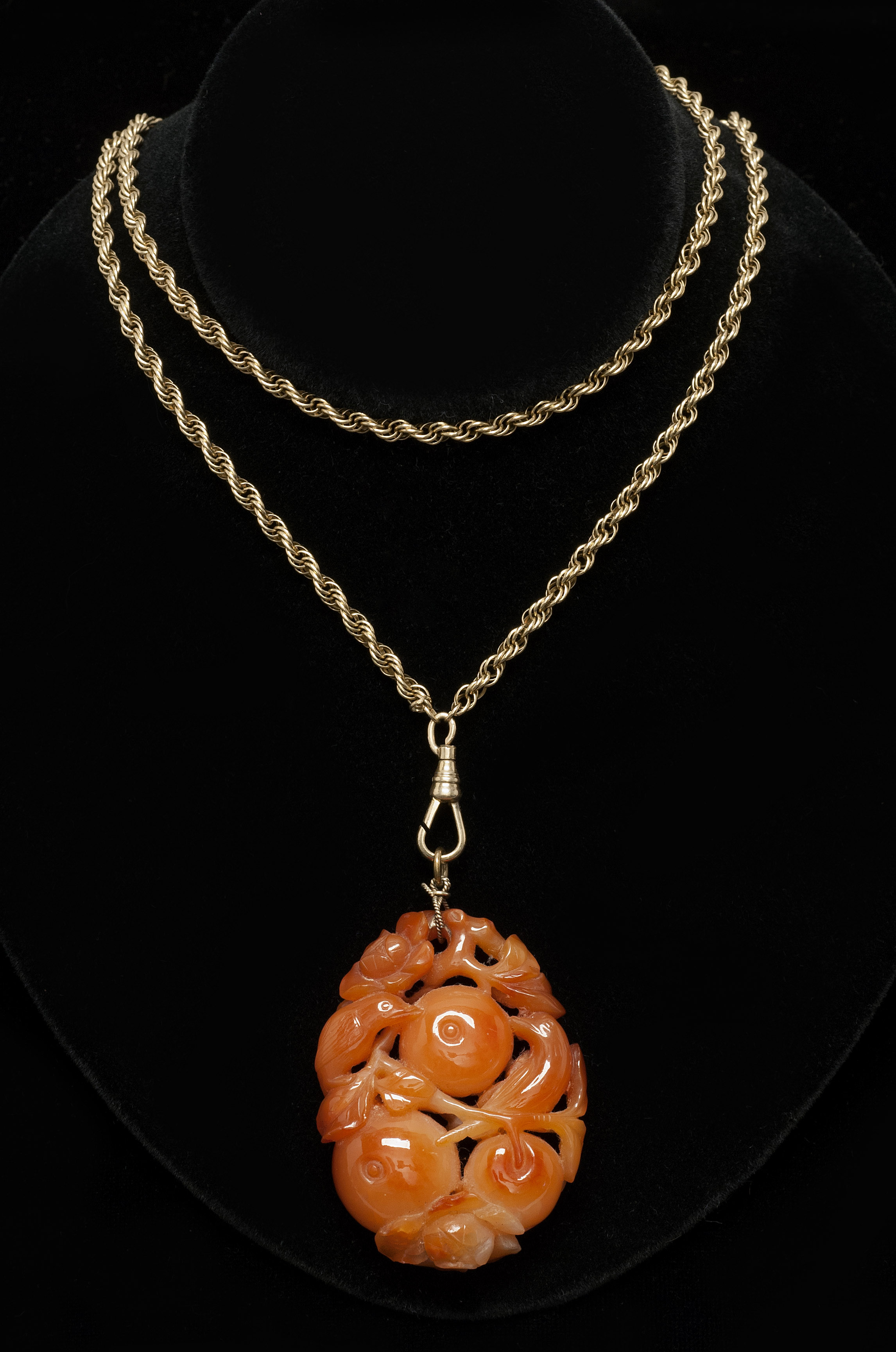 Appraisal: CARNELIAN AGATE PENDANT ON GOLD-FILLED CHAIN Pendant carved with openwork