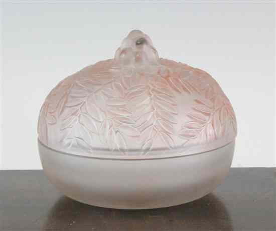 Appraisal: A Lalique 'Vallauris' circular box and cover the moulded cover