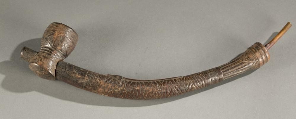 Appraisal: Kuba wooden pipe th century A curved incised wooden pipe