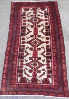 Appraisal: Persian red ground rug the centre with styalised birds cm