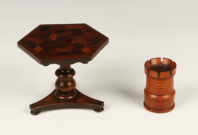 Appraisal: A TREEN CARVED WOODEN DICE SHAKER of turret form cm