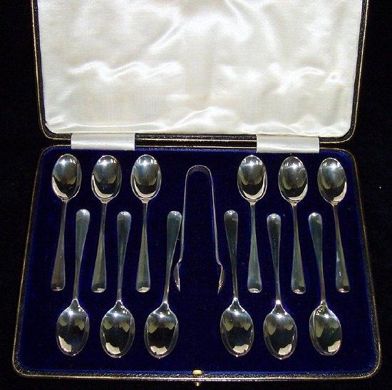 Appraisal: Twelve rat tail pattern teaspoons and the matching tongs Sheffield