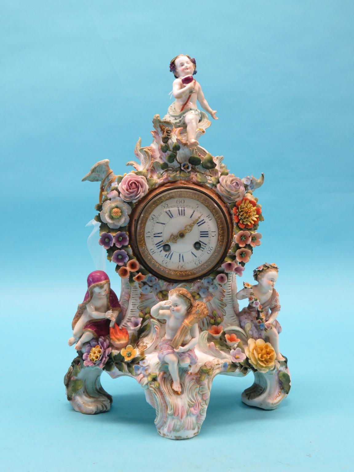 Appraisal: A th century Sitzendorf-type porcelain mantel clock mounted with four