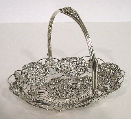 Appraisal: American sterling silver cake basket Ferdinand Fuchs Bros maker's mark