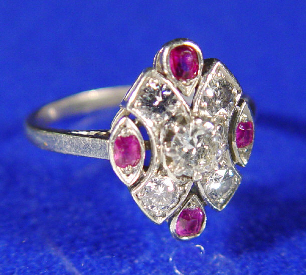 Appraisal: Art Deco style platinum diamond and ruby ring the central