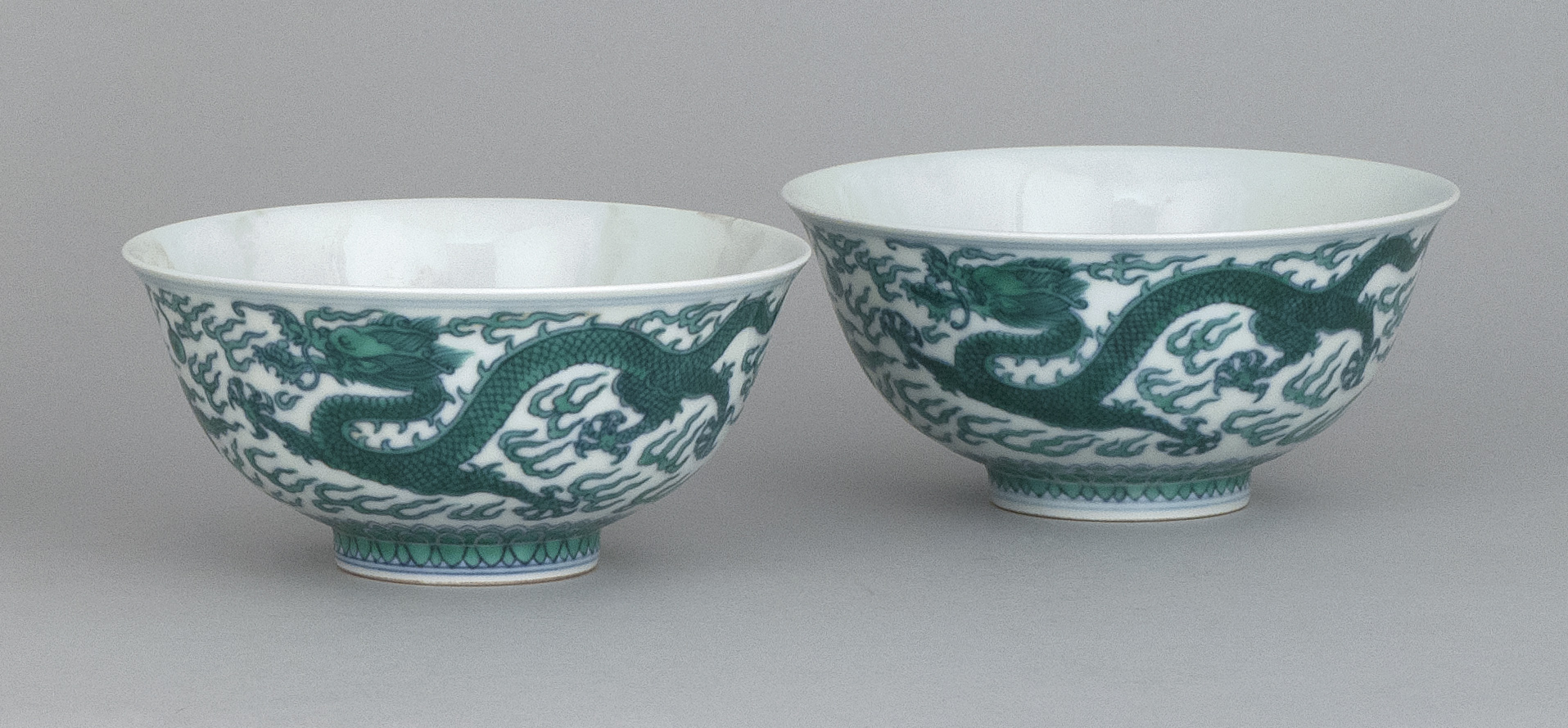 Appraisal: PAIR OF UNDERGLAZE BLUE AND GREEN ENAMEL PORCELAIN BOWLS In