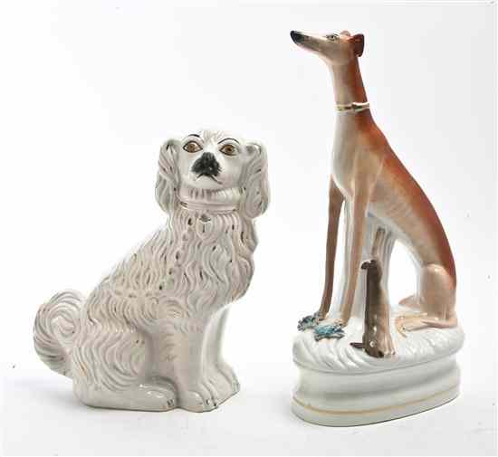 Appraisal: A Staffordshire Spaniel of typical form together with a Staffordshire