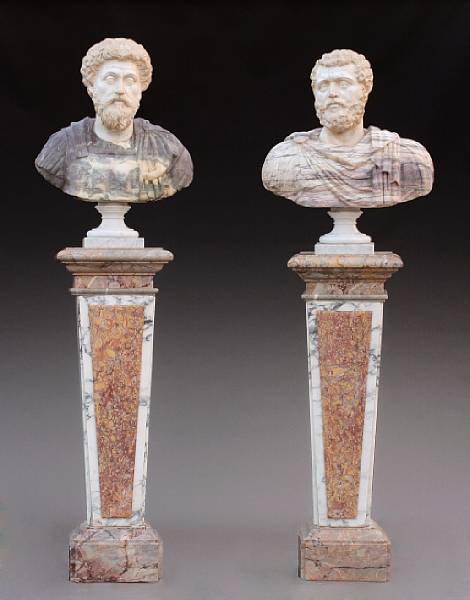 Appraisal: A pair of variegated marble busts of Roman emperors on