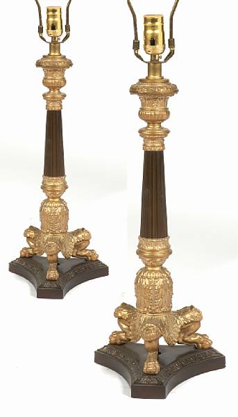 Appraisal: An Empire style gilt and patinated metal table lamp th