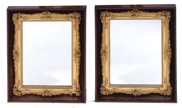 Appraisal: A PAIR OF VICTORIAN GILT PLASTER MIRRORS each set within