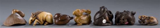 Appraisal: Group of carved wood netsukes th century Mushroom with applied