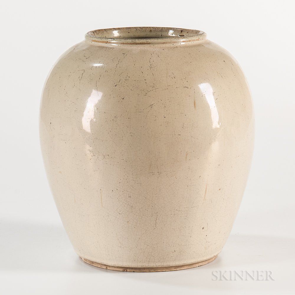 Appraisal: Cream-glazed Jar Cream-glazed Jar China oval with rolled rim slightly