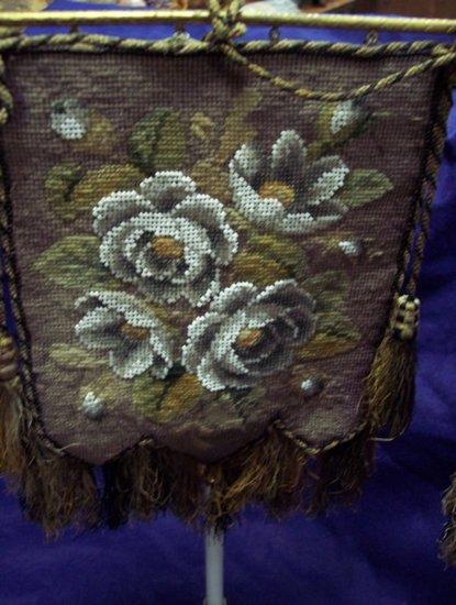 Appraisal: Two Victorian beadwork table screens decorated roses on an engraved