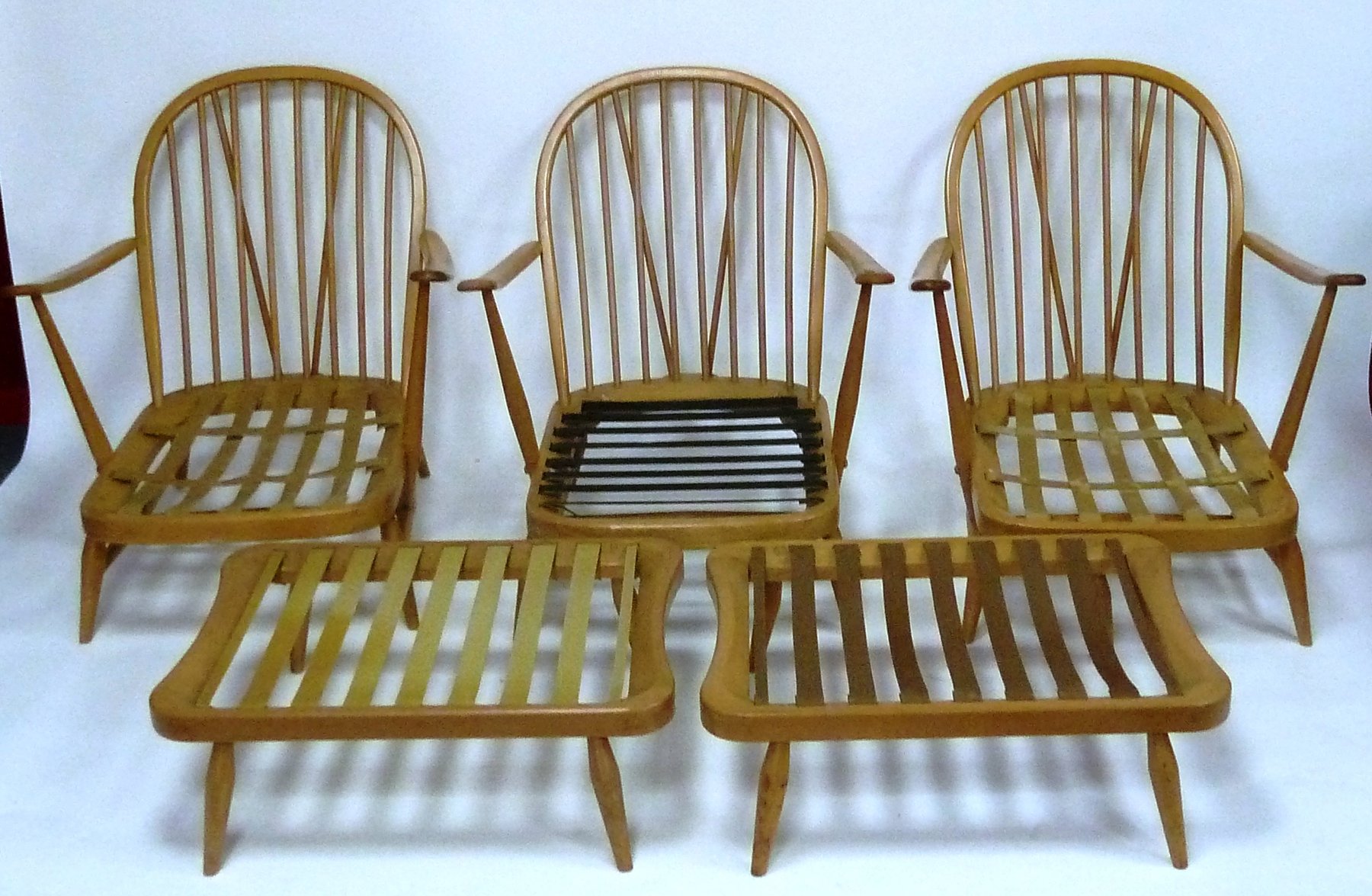 Appraisal: Four retro Ercol armchairs and two stools