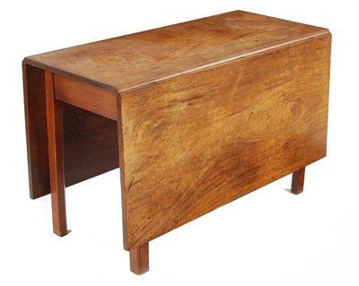 Appraisal: A George III mahogany drop leaf table on moulded square