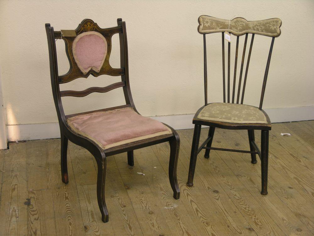 Appraisal: A late Victorian inlaid rosewood nursing chair with upholstered seat