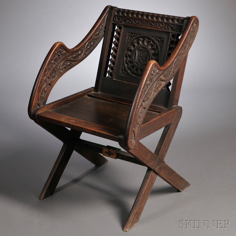 Appraisal: Gothic Revival Oak Glastonbury Chair late th century back carved