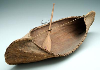 Appraisal: Bark canoe model woven maple split rim in damage and