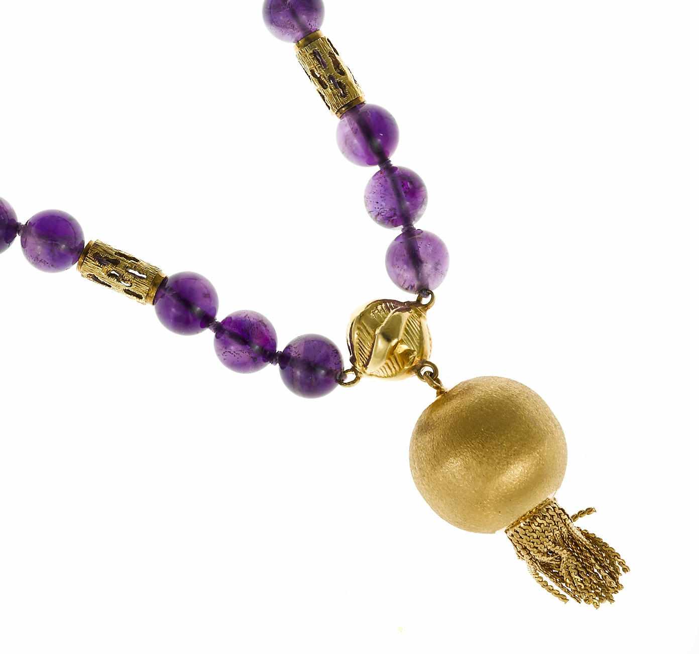 Appraisal: An amethyst bead and eighteen karat gold necklace Van Cleef