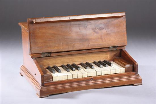 Appraisal: EDWARDIAN INLAID WALNUT TABLETOP PIANO Early th century Opens to