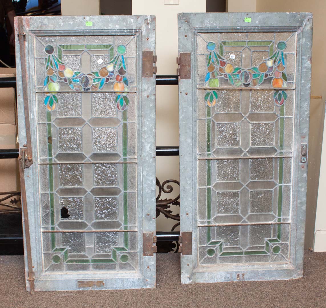 Appraisal: Pair of metal-framed stained glass windows one frame with Underwriter's