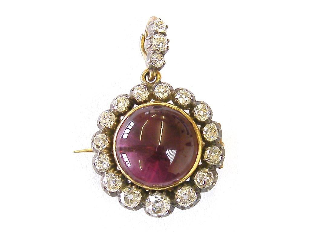 Appraisal: Attractive diamond and gem circular pendant brooch set with a