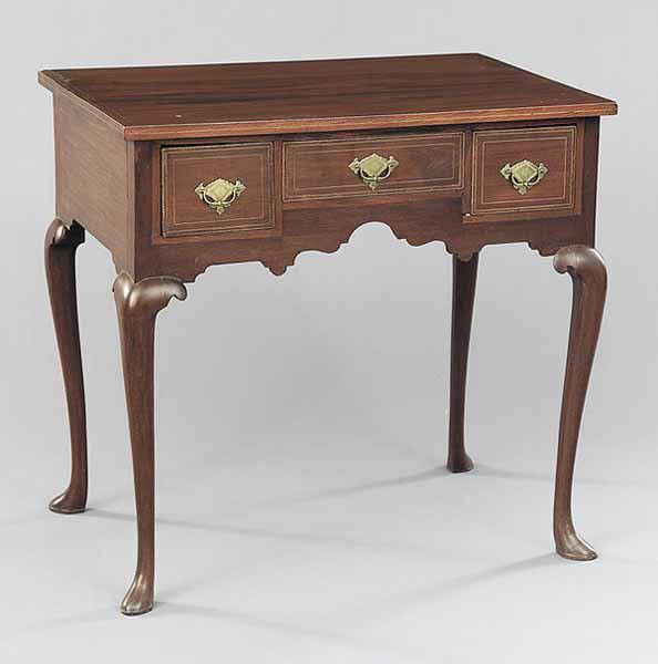 Appraisal: A George III-Style Inlaid Mahogany Lowboy th c the rectangular