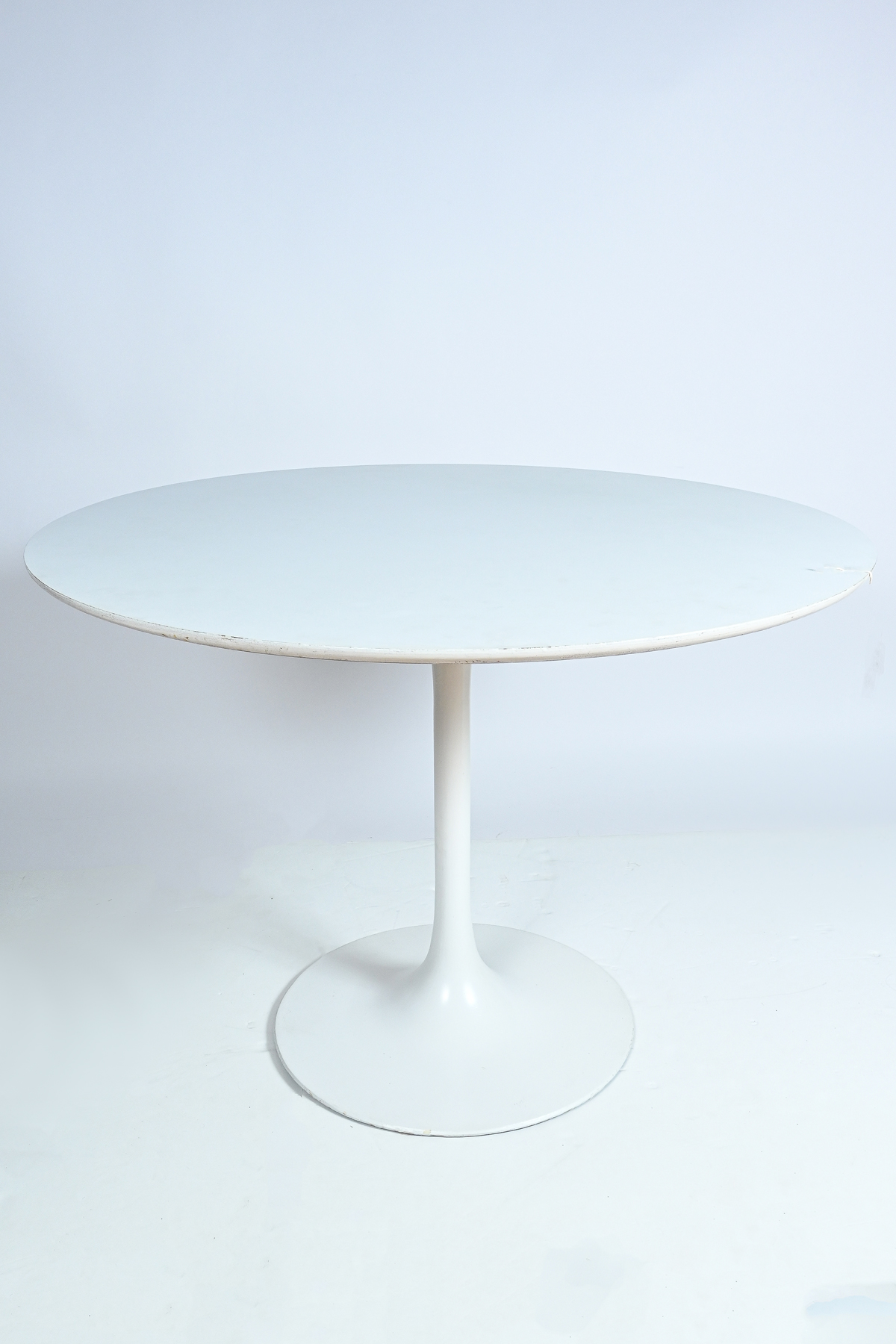 Appraisal: MID-CENTURY MODERN STYLE TULIP TABLE White laminate surface mounted on