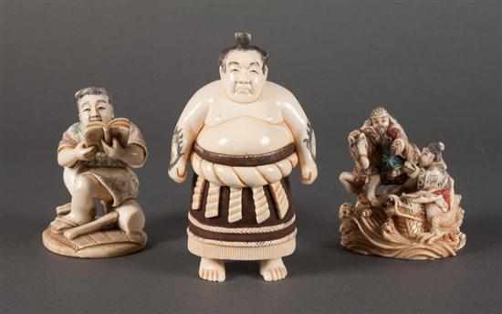 Appraisal: Japanese carved ink-highlighted ivory figure of a Sumo wrestler seated