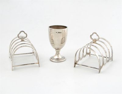 Appraisal: A pair of five bar toast racks by CSG and