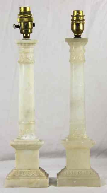 Appraisal: A pair of alabaster column table lamps with parchment shades