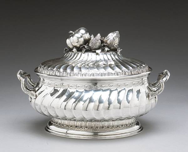 Appraisal: A continental hand wrought sterling soup tureen with cover after