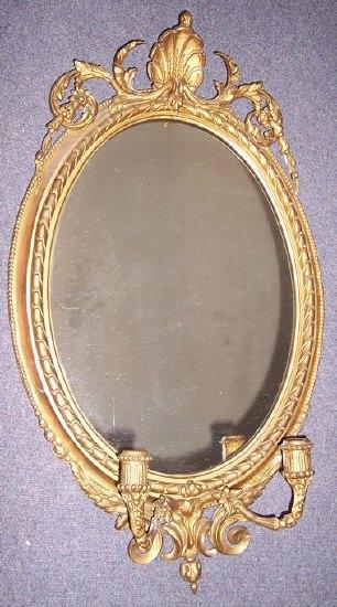 Appraisal: A Victorian plaster gilt girandole with oval plate cm high