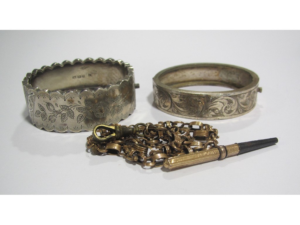 Appraisal: Lot comprising two Victorian silver engraved childs bangles and a