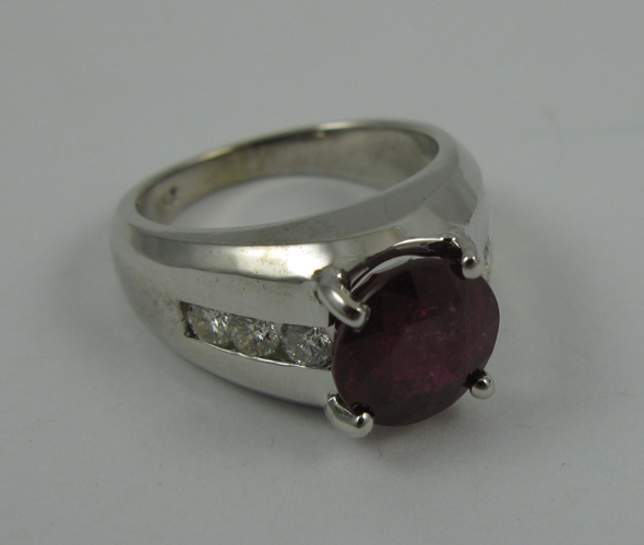 Appraisal: RUBY DIAMOND AND K WHITE GOLD RING set with a