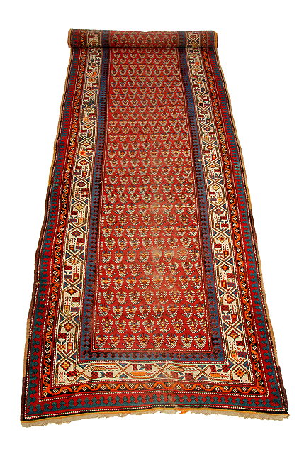 Appraisal: AN ANTIQUE HAMADAN BRICK GROUND RUNNER with geometric decoration to