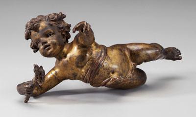 Appraisal: Bronze cupid in flight torch in right hand sash around