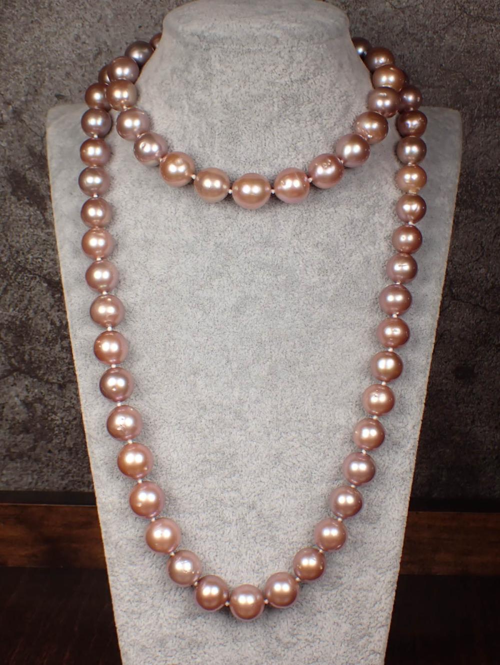 Appraisal: OPERA LENGTH PINK PEARL NECKLACE hand-knotted strand of well matched