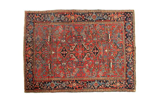 Appraisal: ORIENTAL RUG Heriz ca Bold design with red ground and