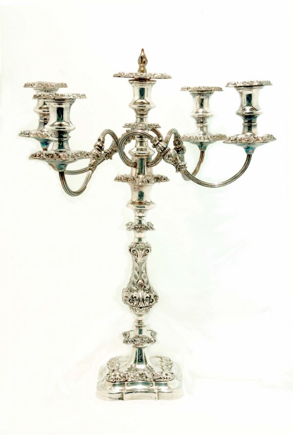 Appraisal: A large silverplated five lite candelabra Two part Center holder