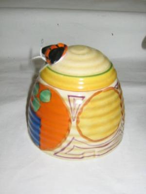 Appraisal: A CLARICE CLIFF POTTERY HONEY POT of reeded ovoid form