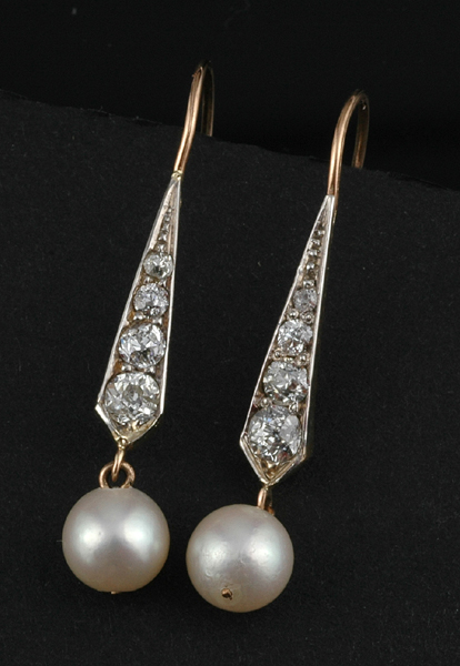 Appraisal: A PAIR OF DIAMOND AND PEARL DROP EARRINGS Each set