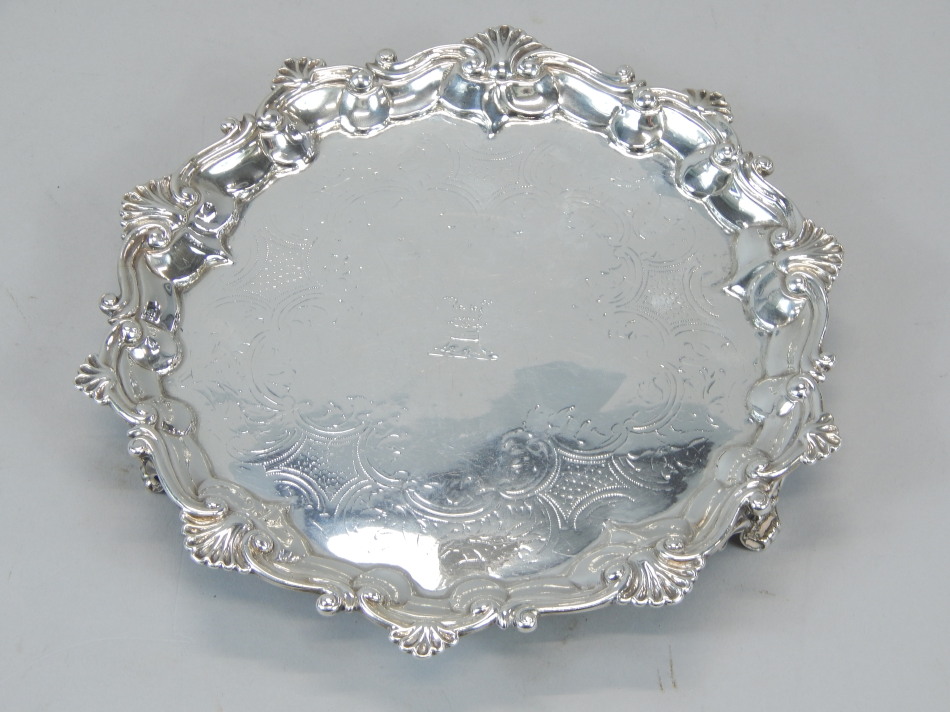 Appraisal: A Victorian silver salver with cross border and engraved decoration