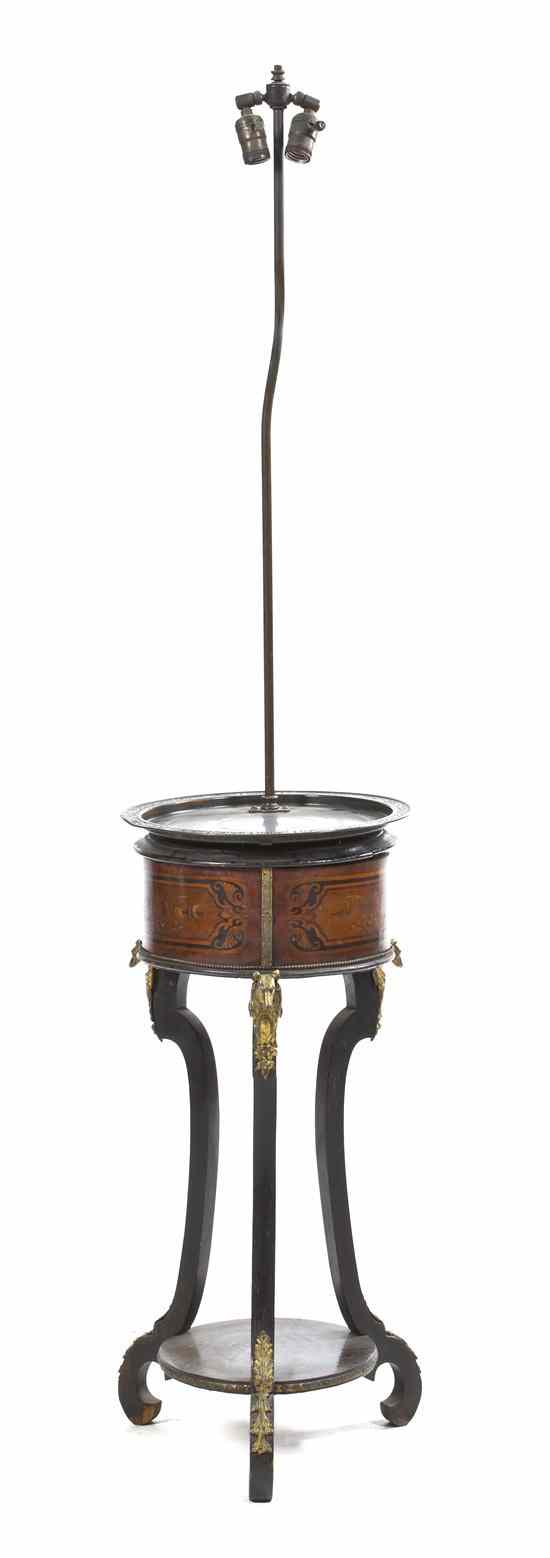 Appraisal: A Continental Marquetry and Gilt Metal Mounted Jardiniere having a