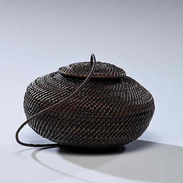 Appraisal: Eskimo Lidded Basket finely coiled with twisted hide thong attaching