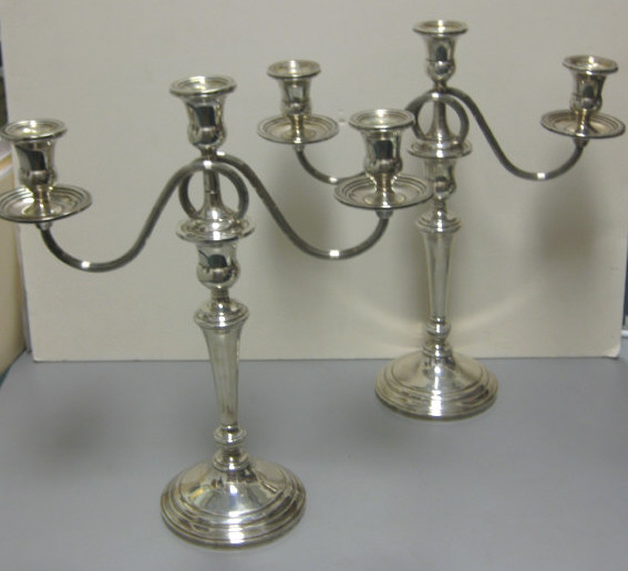 Appraisal: PAIR OF WEIGHTED SILVER CANDELABRA Three reeded scroll removable arms