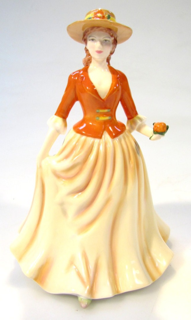 Appraisal: A Royal Doulton International Collectors Club figure Autumn Stroll HN