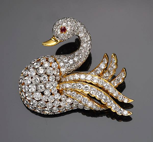 Appraisal: A diamond and ruby brooch in the form of a